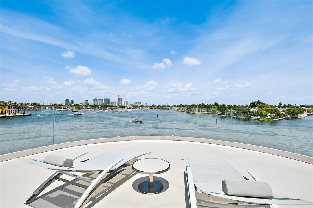 This is the 3rd story sundeck accessible by spiral staircase.  Incredible 360 degree Views!