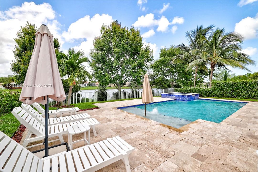 Large Pool Deck with Polywood Lounge Chairs