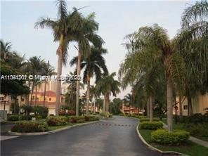 Tree-lined streets with guard-gated entry