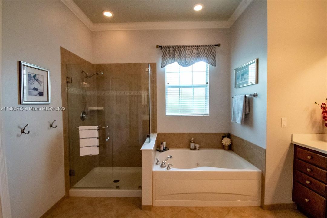 Primary Bathroom with Shower and Bathtub