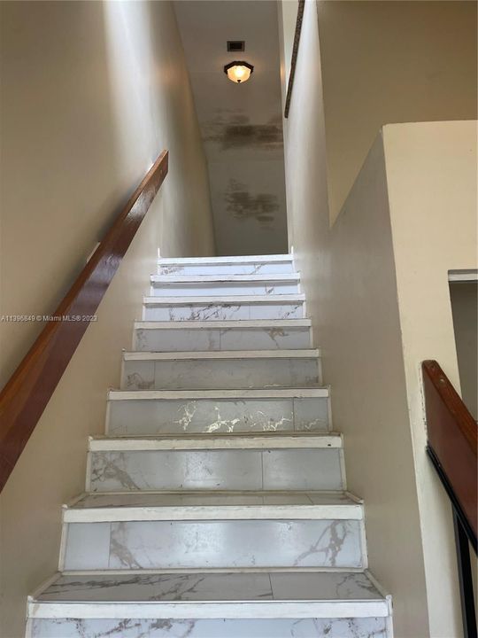 Stairs going up to the unit