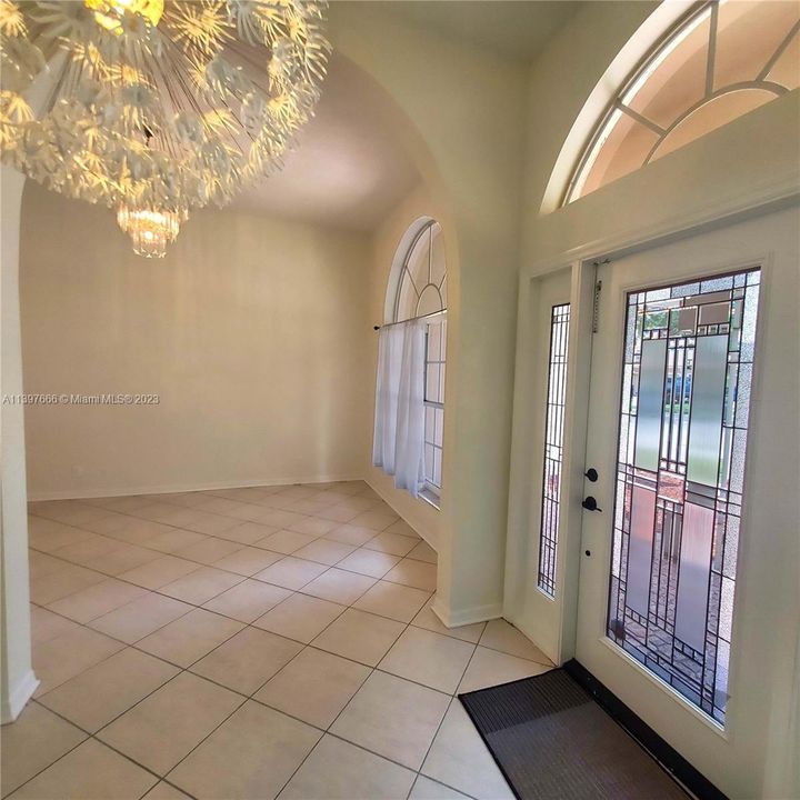Front entrance with formal dining room