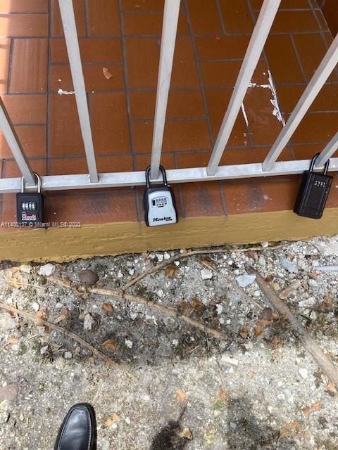 LOCK BOX LOCATION -FENCE ENTRANCE BUILDING