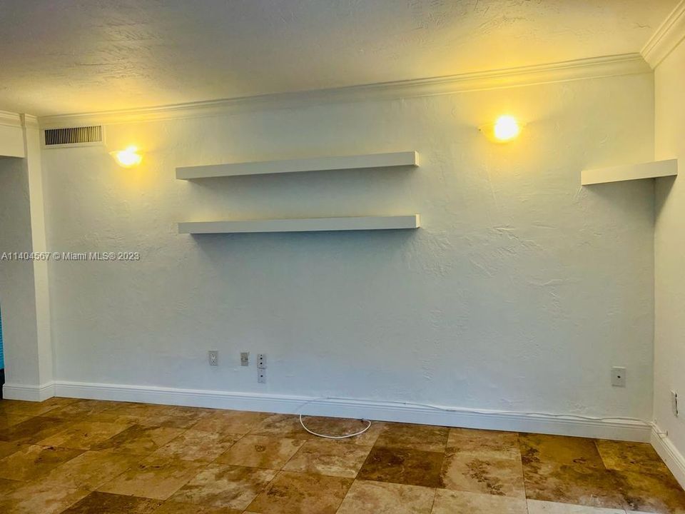 Built in shelving on wall