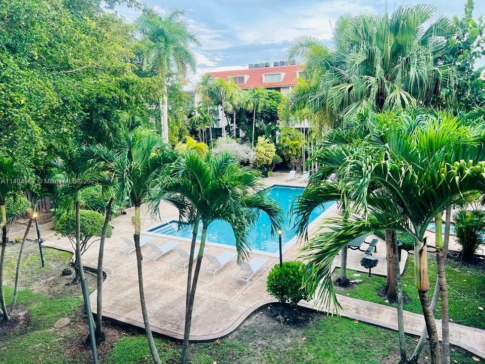 Unit is perched above pool and jacuzzi.  One of the best views in community