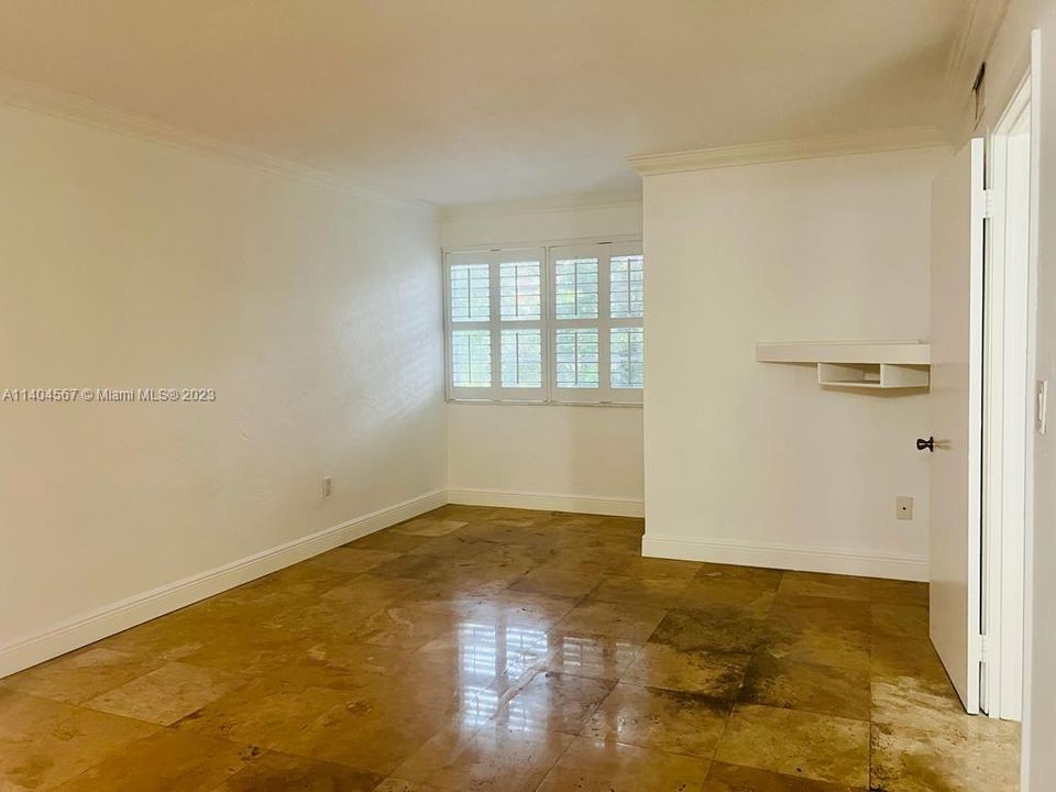 Master bedroom with area for reading nook or small home office