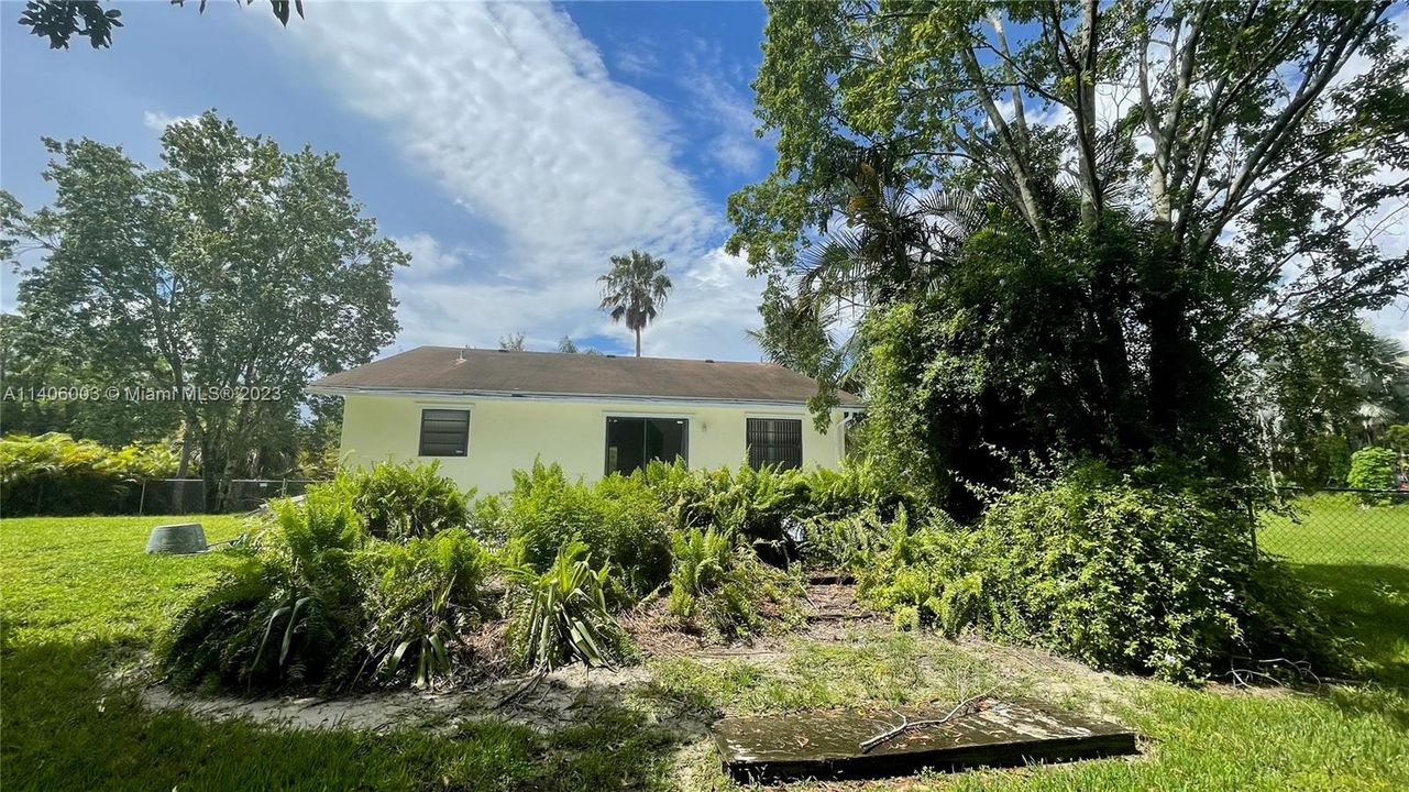 Back yard with a secondary fence