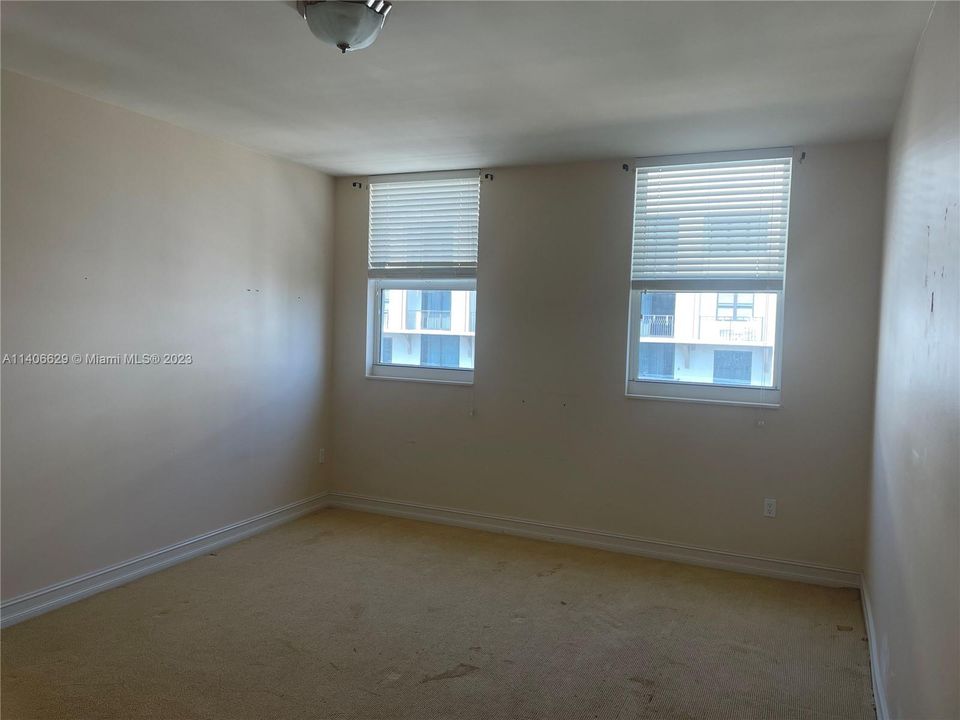 Bedroom #1 looking in. BTW, 2 small dogs are allowed in this building, but not at Publix. (That's what you think)