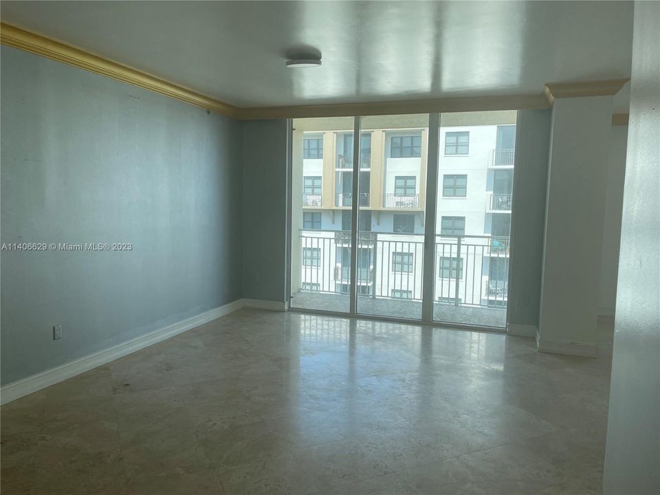 dining area /bedroom #4 A legal bedroom requires a window, closet area and access to the main living area. How many hundreds of thousands of dollars does having a 4 bedroom in the bedrock building at Mizner Park? Just add a wall and a Vodka Tonic.