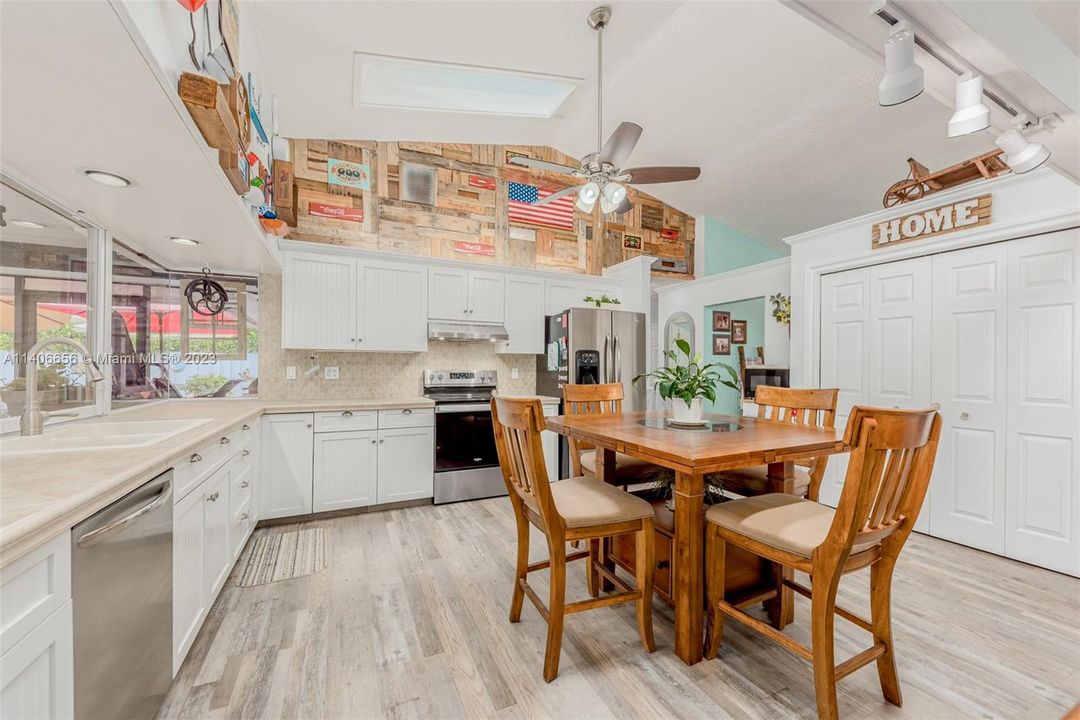 Large Open Kitchen with lots of natural light and counterspace