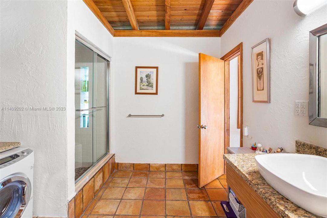 Bathroom with washer/dryer in detached cottage