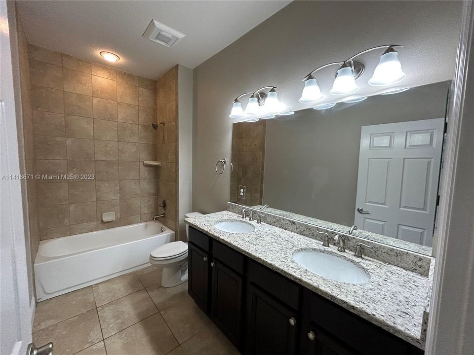 2nd bathroom with double sink vanity