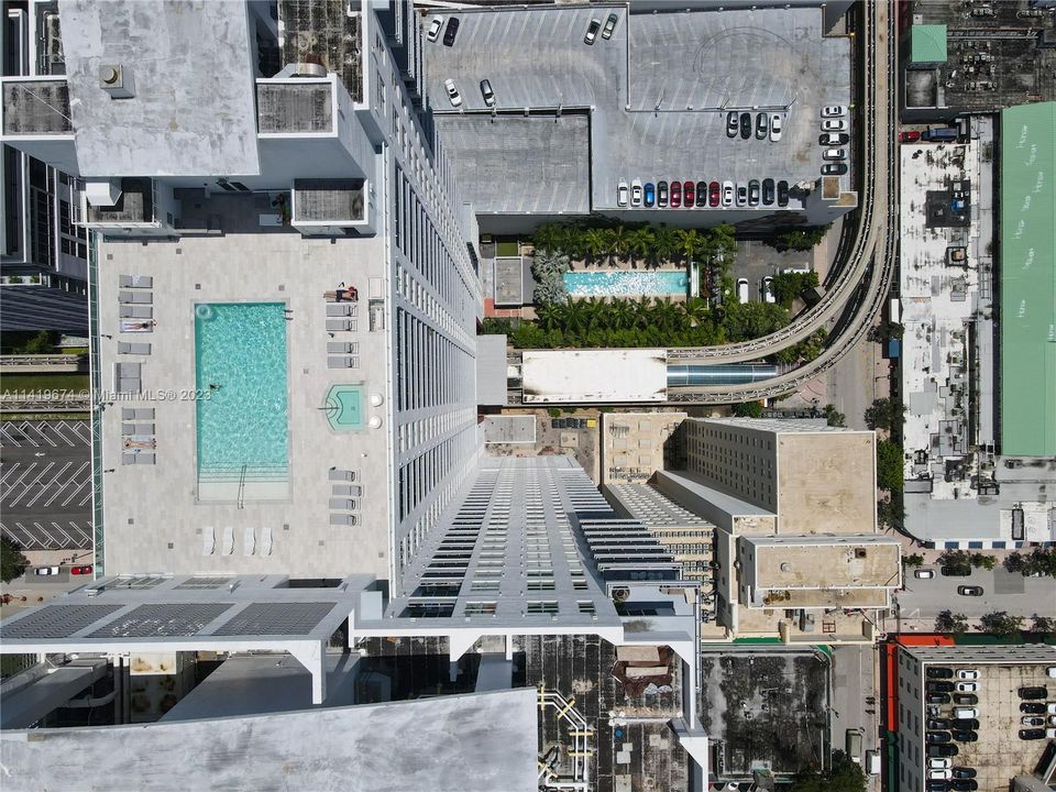 Rooftop Pool and Jacuzzi, and lap pool seen below on ground.