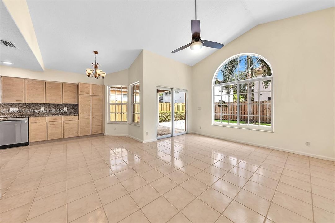 Family room view looking to sliding door to pool.