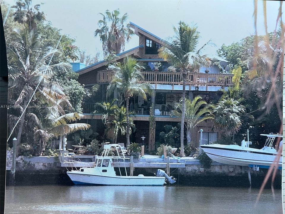 View of Rear of Home and Dock from Water
