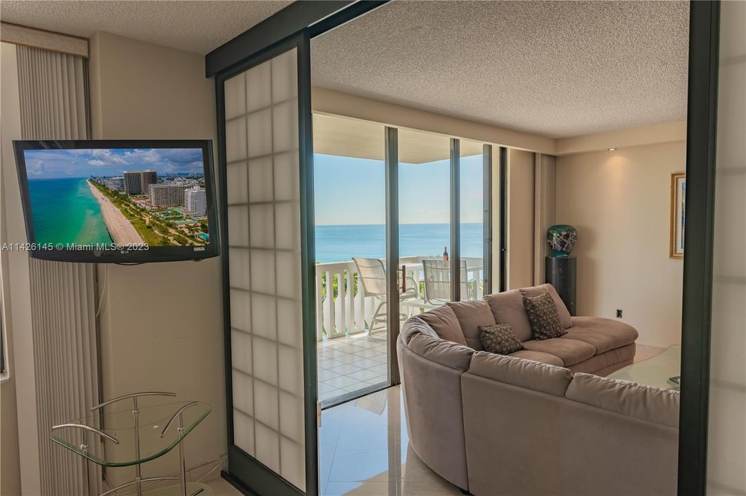 Den/Bedroom into Living room