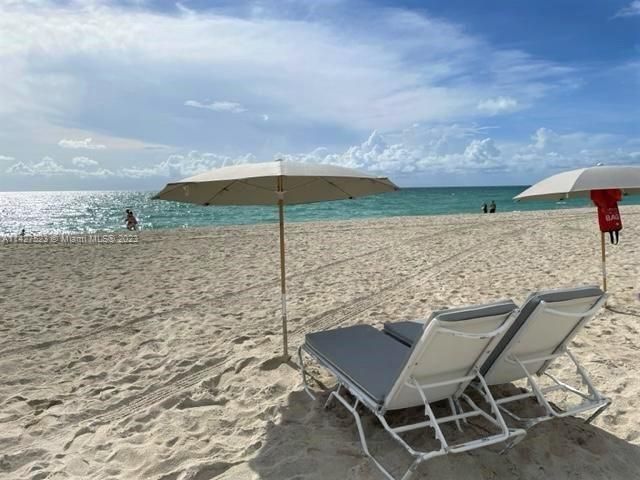 FREE chairs & umbrella Beach service