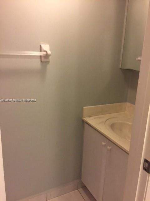 Half Bath from similar unit with same square footage and layout only in reverse