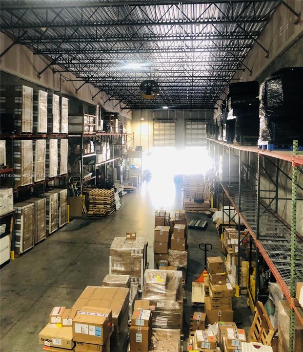 View from mezzanine overlooking warehouse operation.