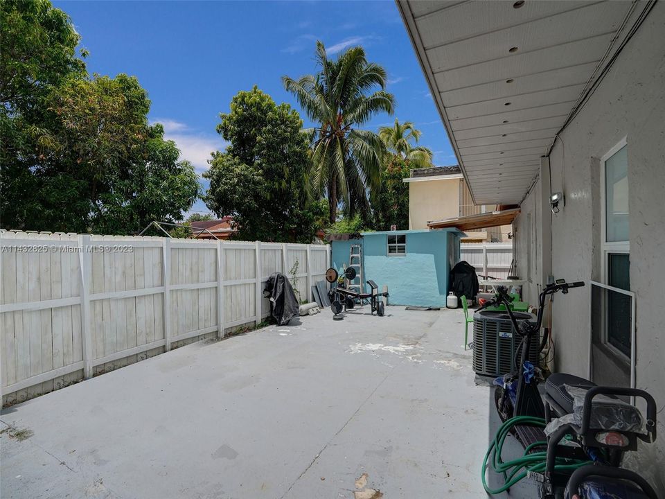 back yard with storage room