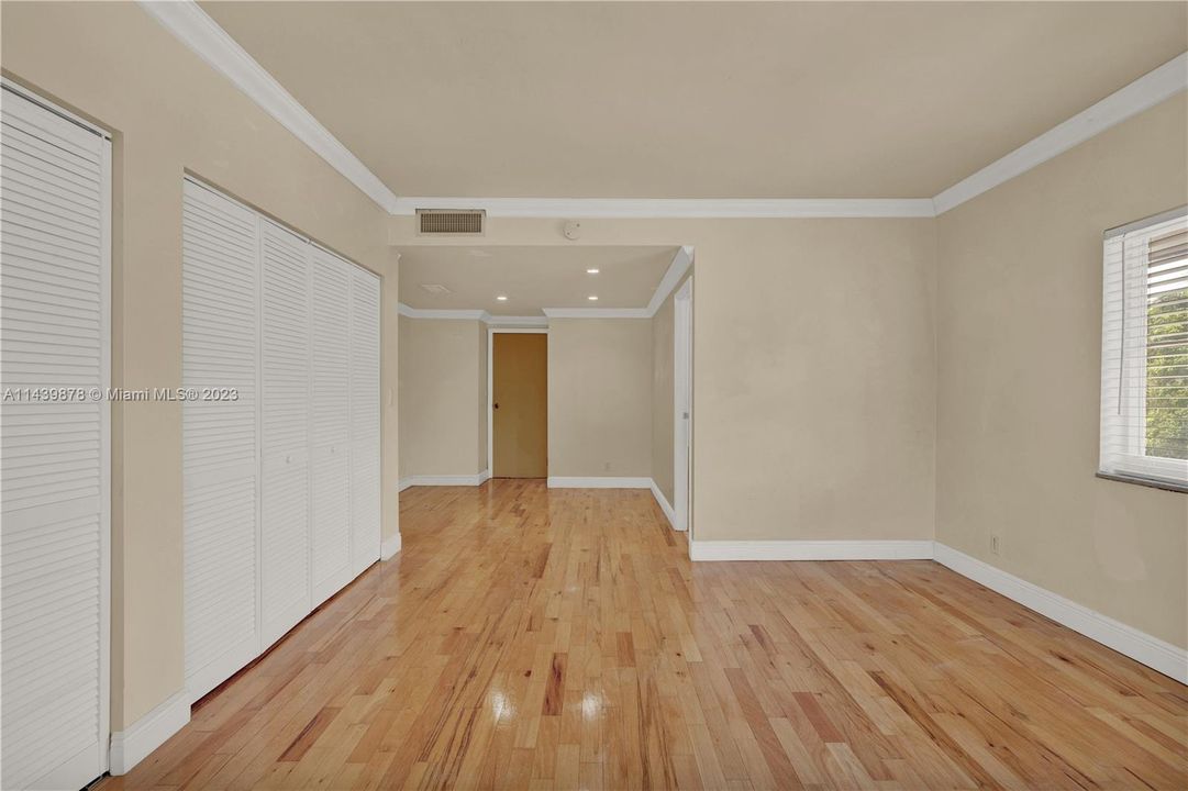 wall to wall closets and wood floors