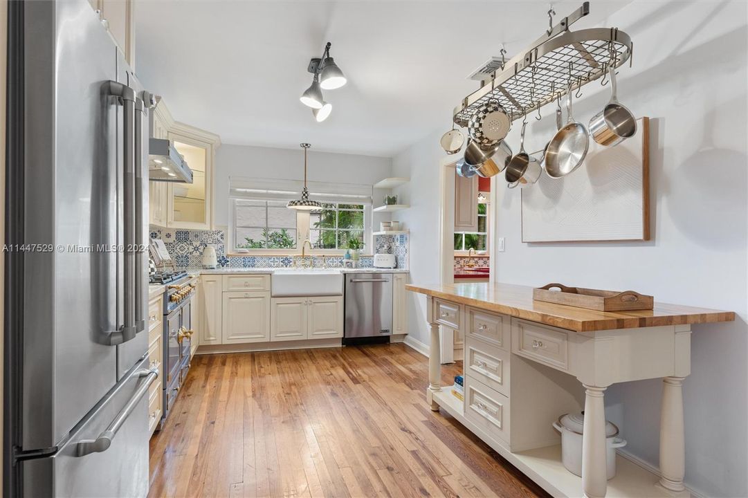 Kitchen leads to separate butler's pantry