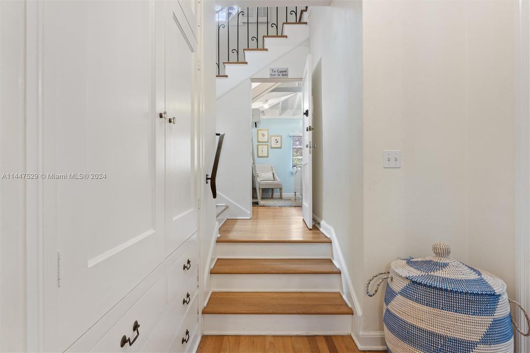 Steps lead to small office   then aloft to the primary bedroom suire