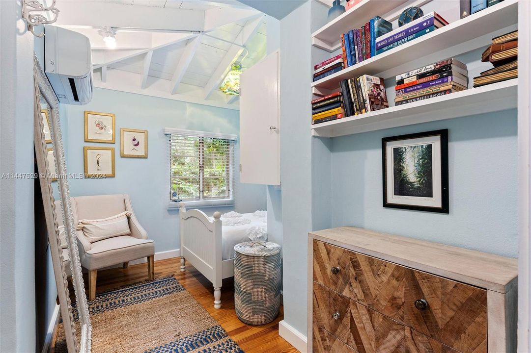 Flexible space, compact & charming at lower stair landing.