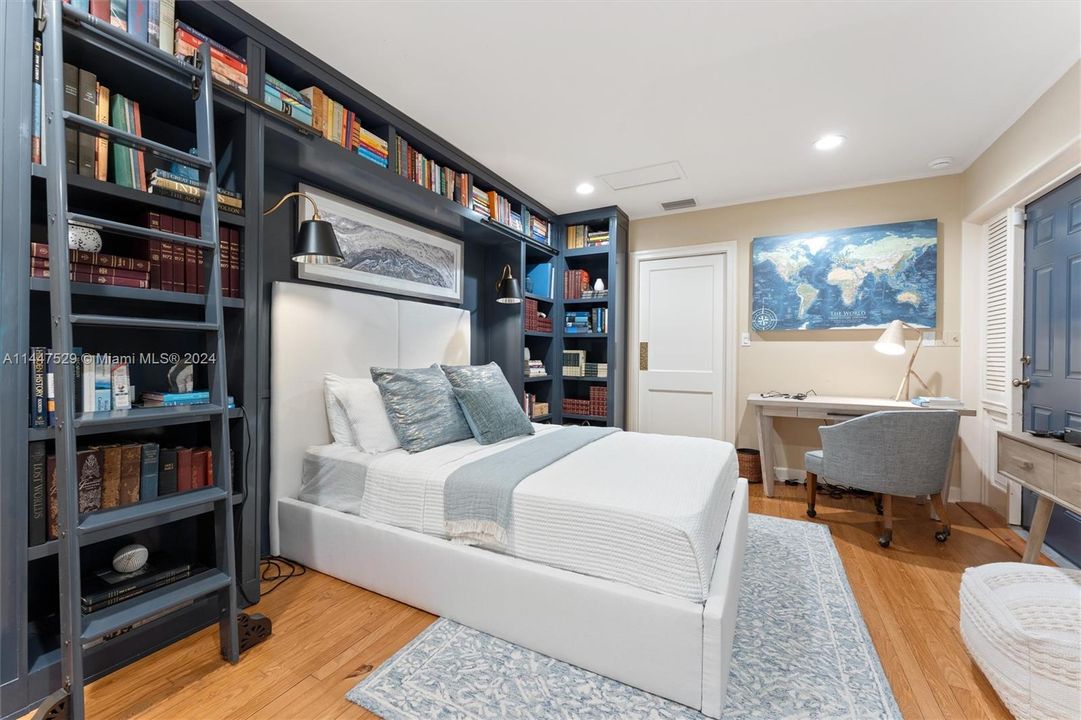 NE bedroom suite downstairs has bedroom + office