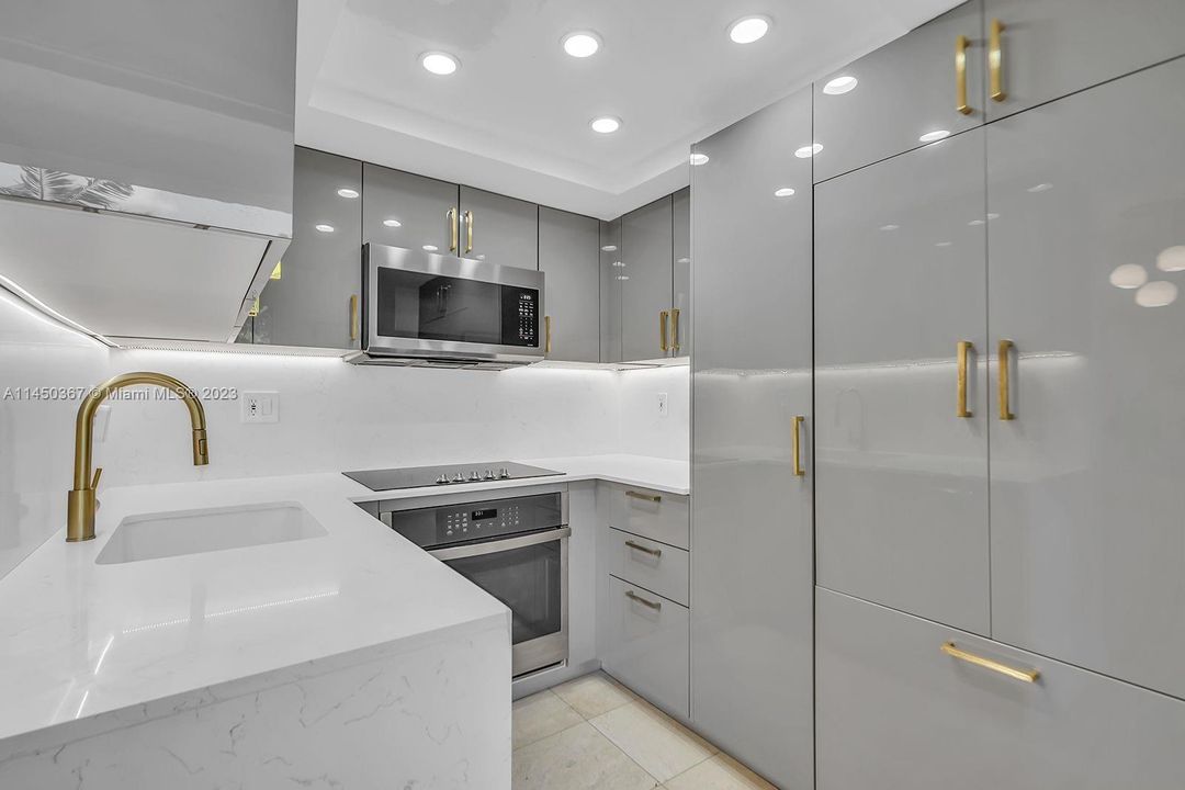 Concealed refrigerator on the right. Italkraft cabinetry