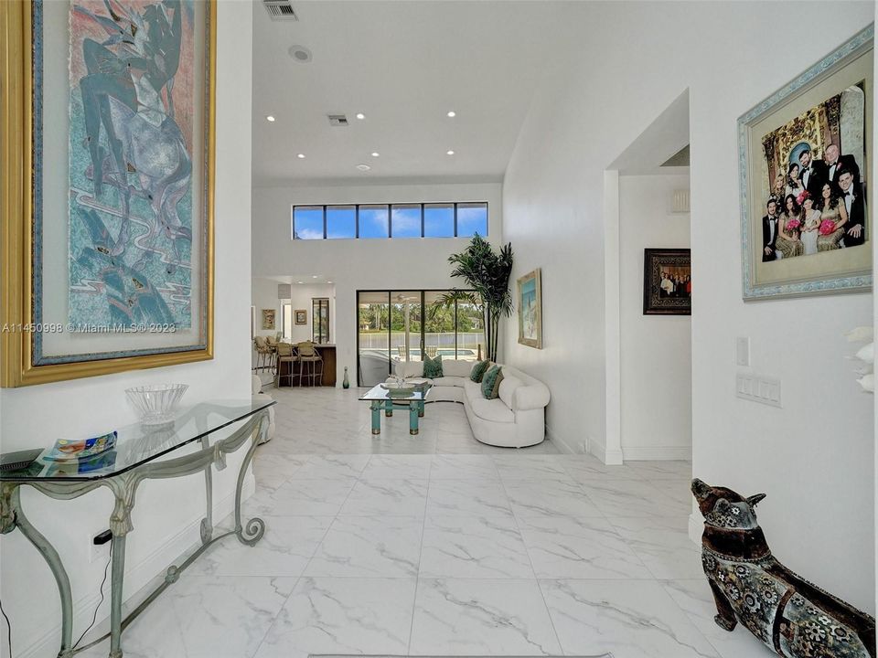 Enclosed area for the kids or pets! Huge pool patio for entertaining !