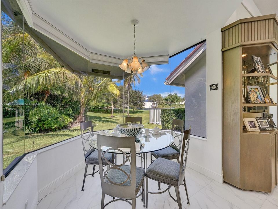 Family room with gorgeous waterview and pool area!