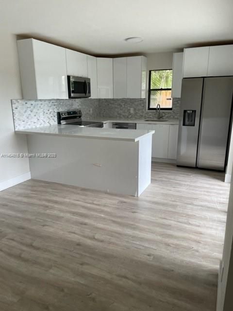 Kitchen open to dining area