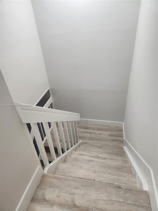 Fresh paint and laminate flooring even on the stairs