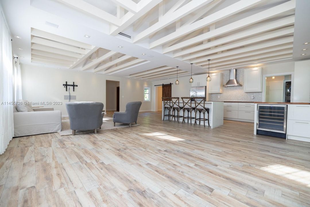 Open concept kitchen, dining room and living room