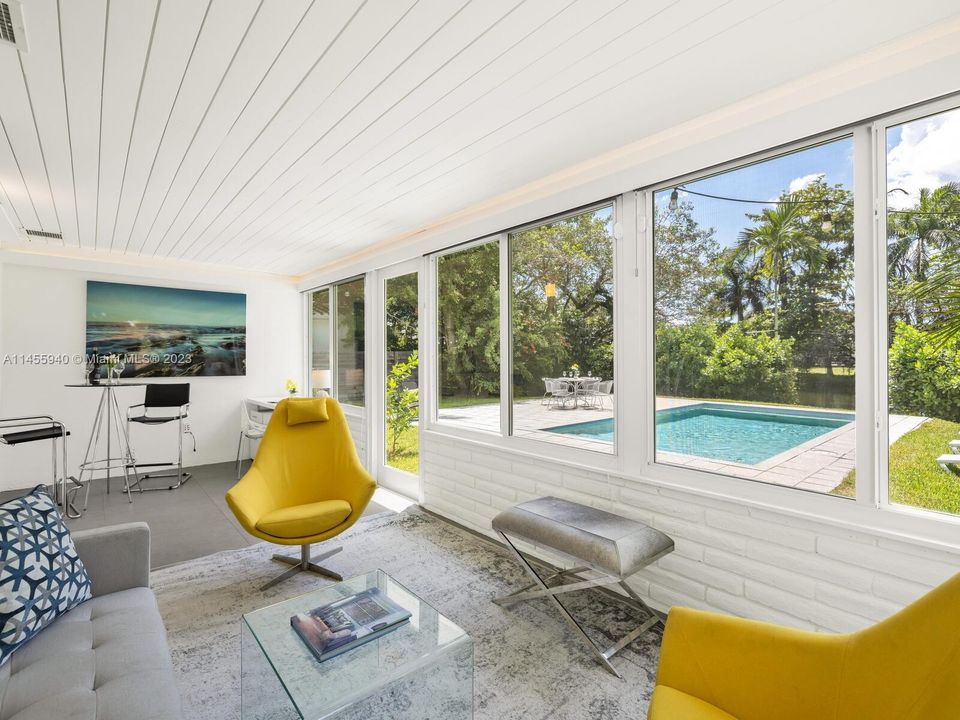 Beautiful Sunroom overlooking the pool