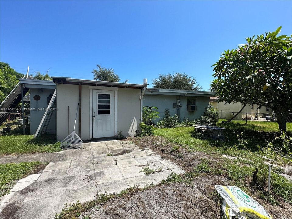 Fruit trees, partially fenced.