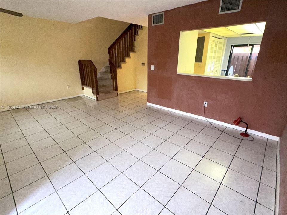 GREAT ROOM DINING AREA AND KITCHEN PASS THROUGH