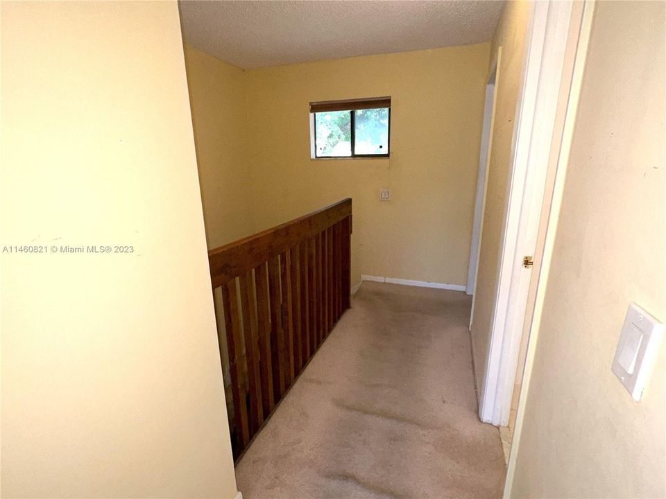 HALLWAY TO 2ND BEDROOM