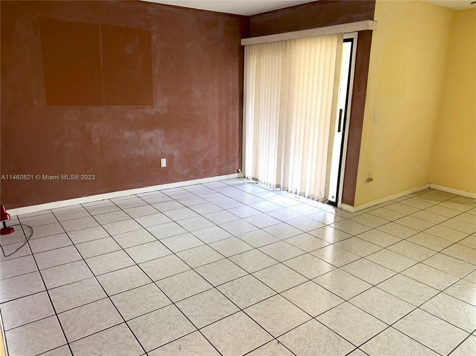 DINING AREA AND BACK PATIO DOORS