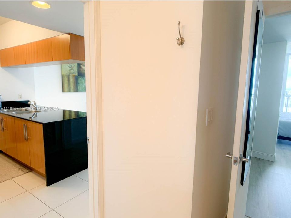 Hall between Bath and kitchen