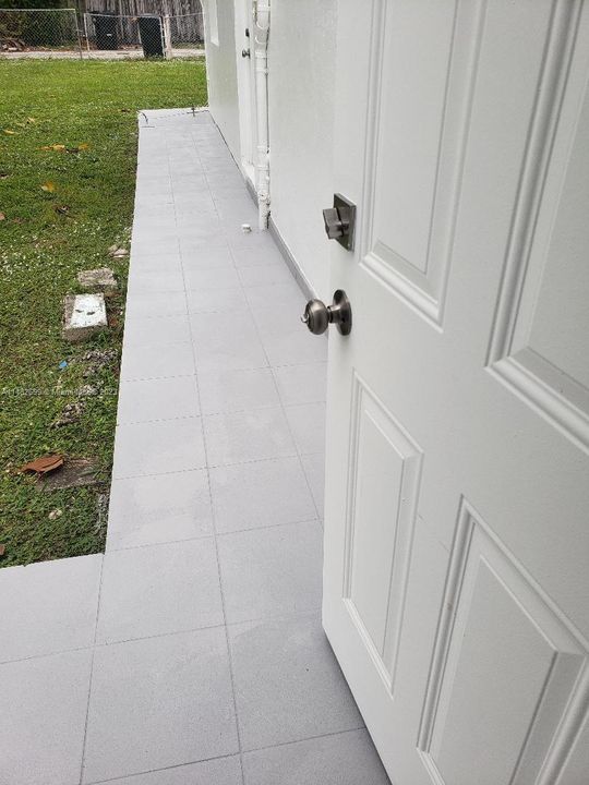 REAR WALK WAY TO THE LAUNDRY WITH NONSLIP FINISH