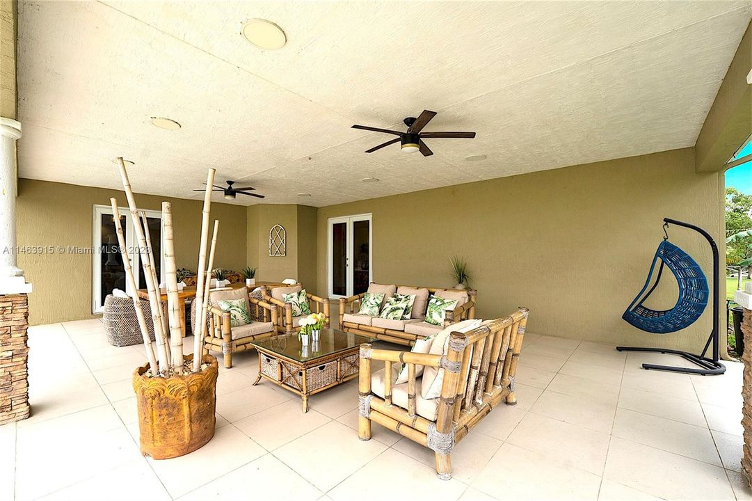 Back patio overlooking the pool and your sprawling 5 acre estate