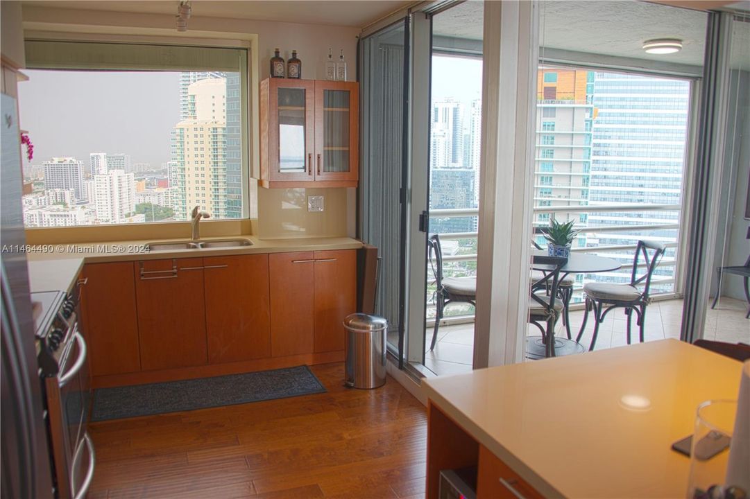 Open kitchen to dining room and one of the terraces