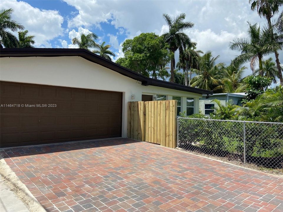 2 car garage with wide driveway for boat storage