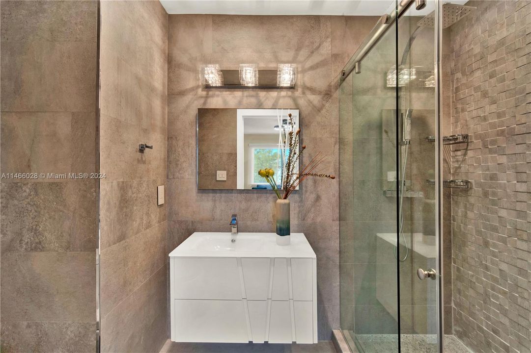 The Bathroom Features High-End Finishes For a Luxurious and Stylish Experience!