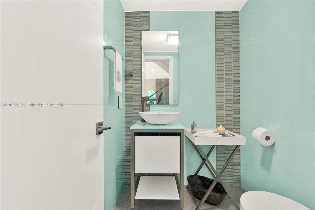 Discover a Chic, Stylish Powder Room on the Main Floor!