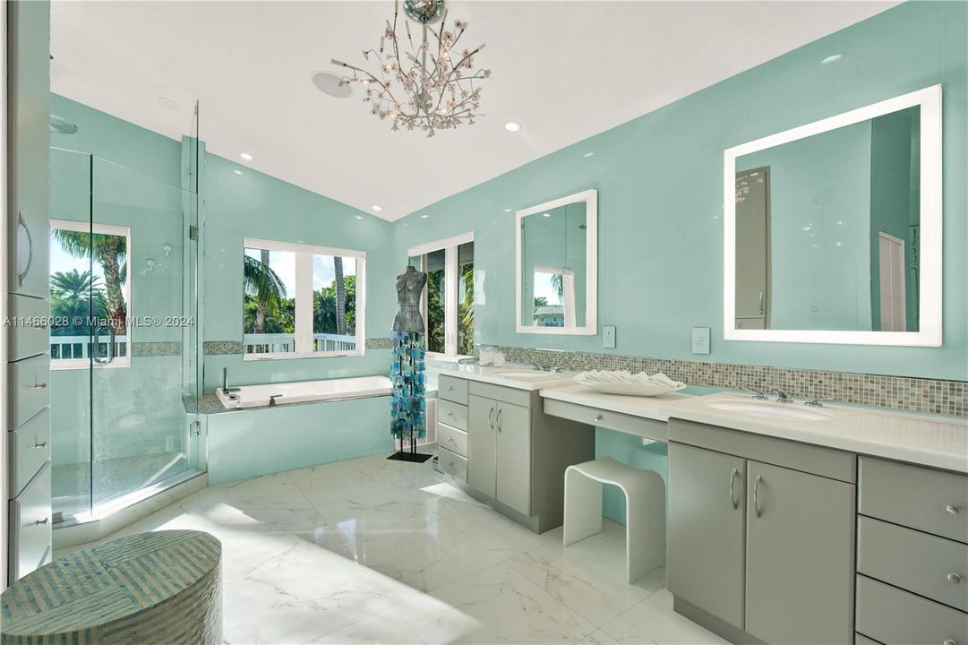 The Master Bathroom Exudes Elegance with its Mint Color Palette and Ample, Spacious Design!