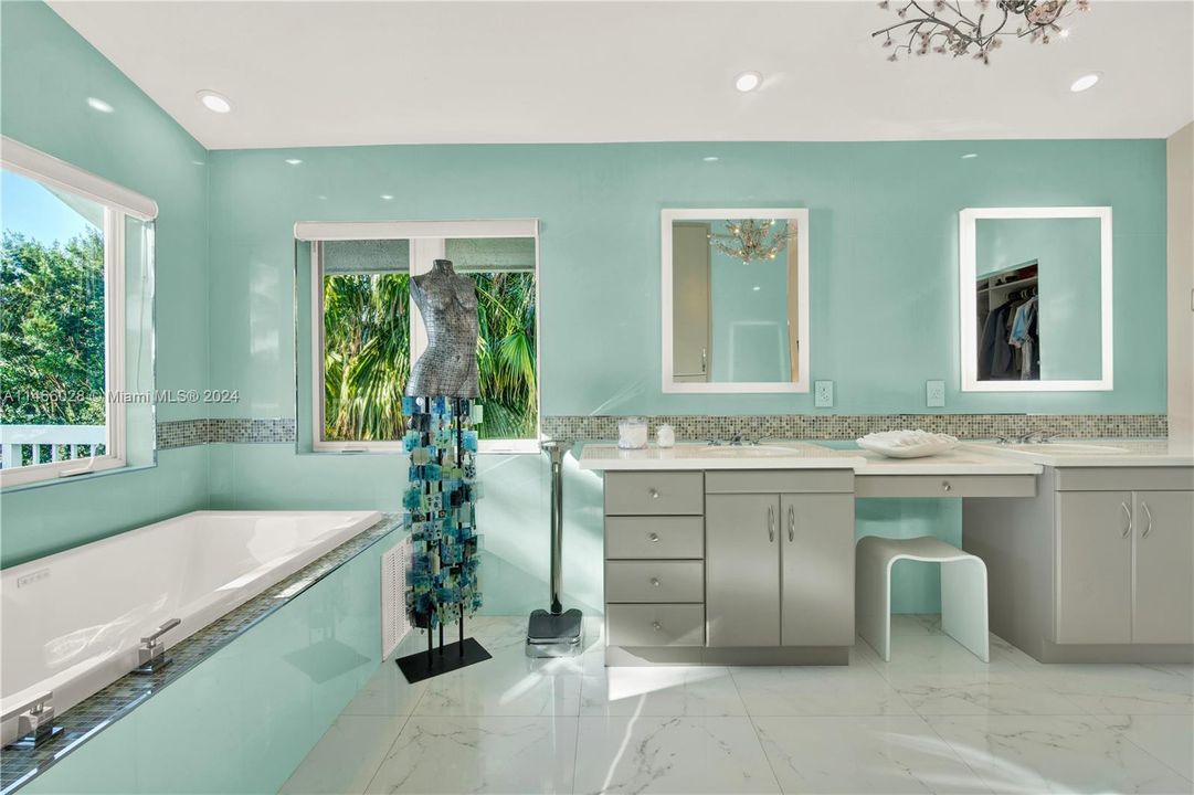 Master Bathroom Features Two Sinks and a Luxurious Bathtub for Relaxing!