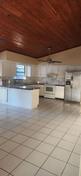 Family Room / Kitchen w. Vaulted Wood Ceiling